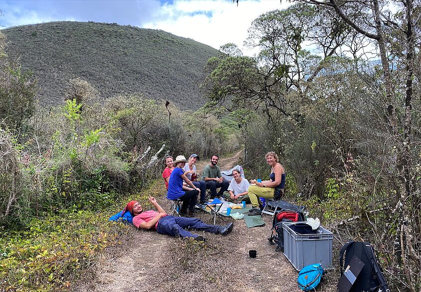 group of young scientists in the field