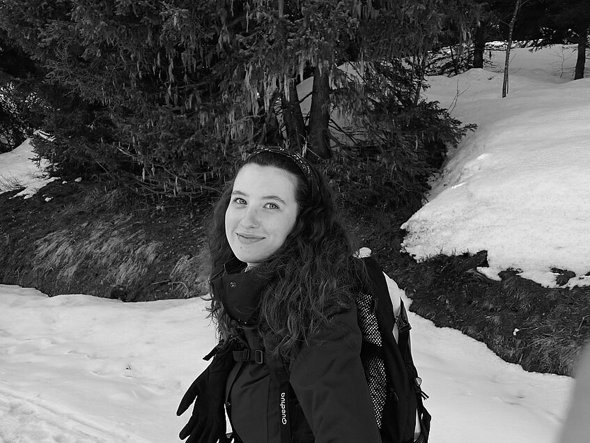 woman hiking in the snow, black/white picture